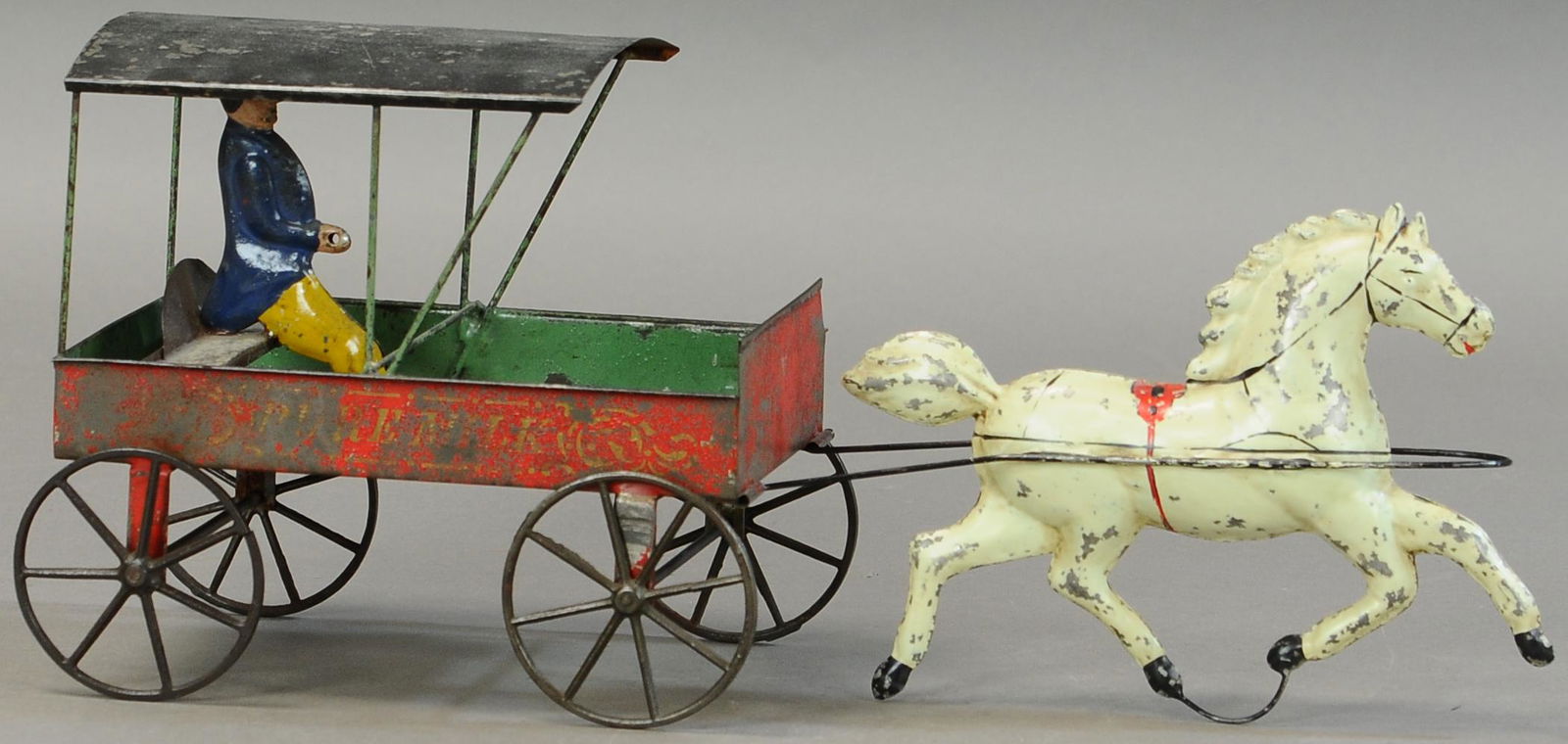ALTHOF BERGMANN PURE MILK DELIVERY WAGON: 346. ALTHOF BERGMANN PURE MILK DELIVERY WAGON | 17" l. | Horse is restored, cart & driver are original w/ rear axle resoldered, (VG-Exc. Cond.) | $500 - $1,000