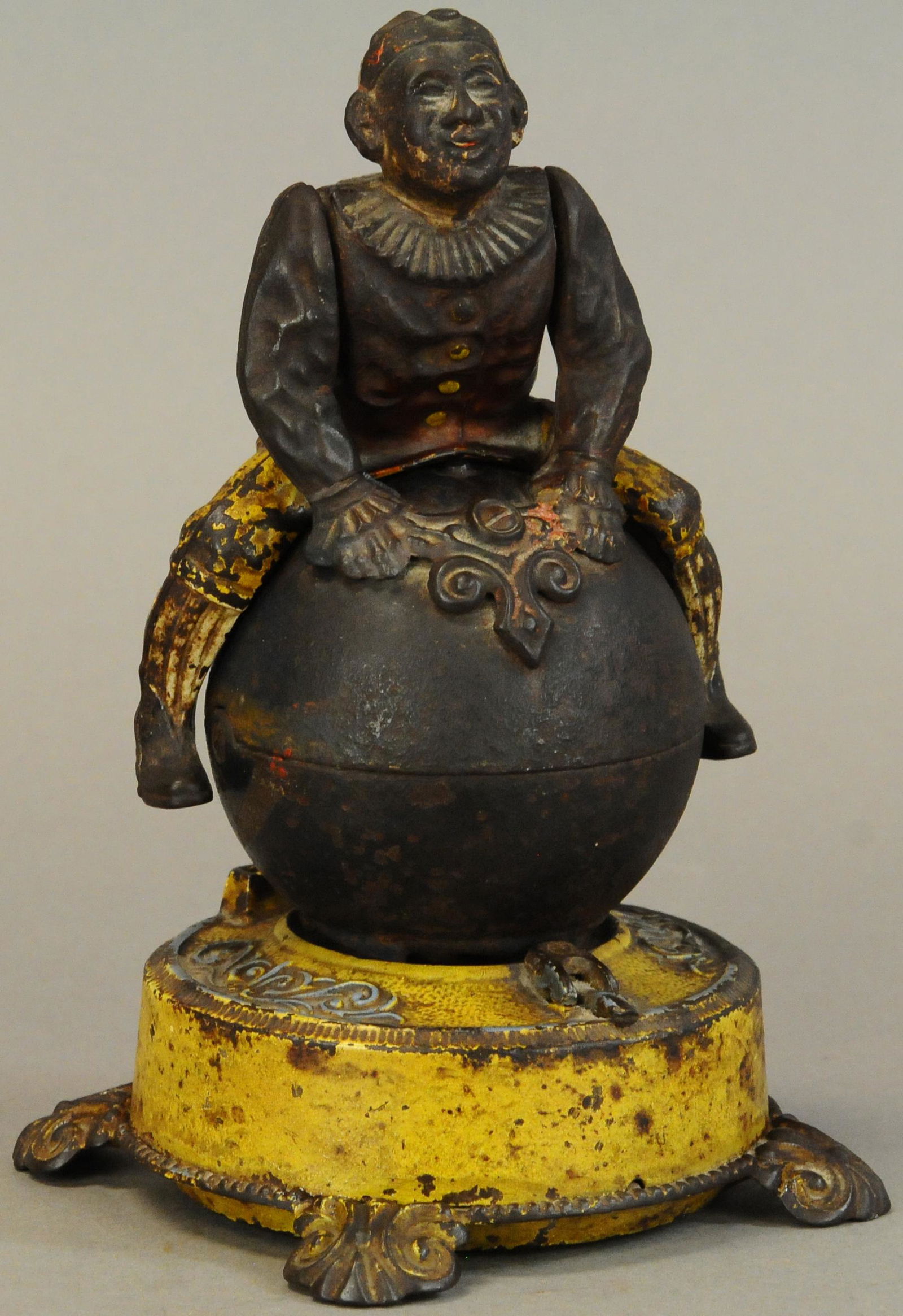 CLOWN ON GLOBE MECHANICAL BANK (1 of 4)