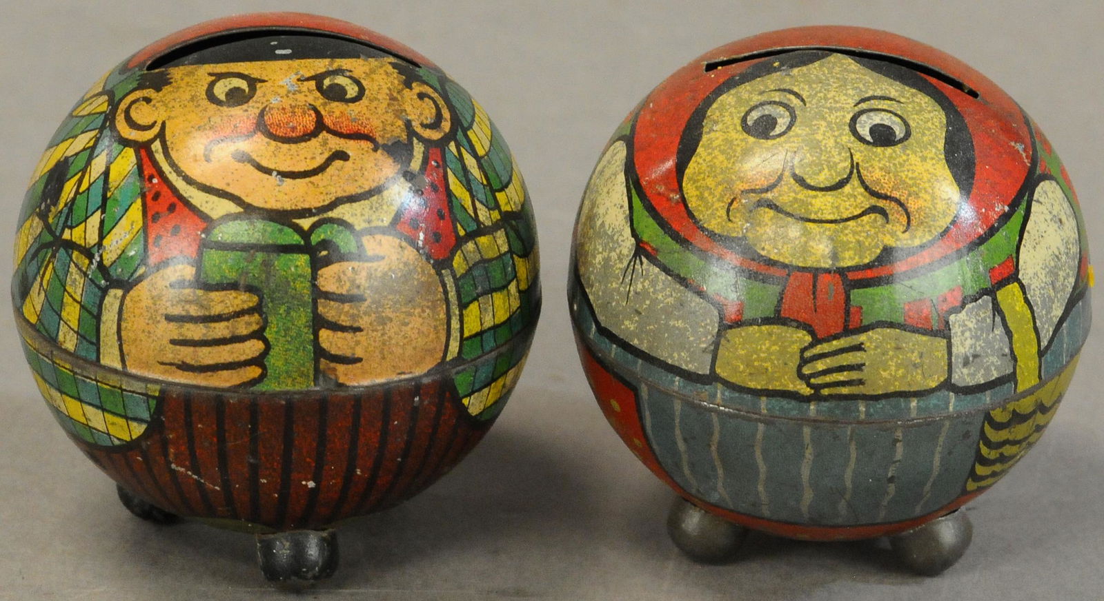 PAIR OF GERMAN TIN BALL BANKS (1 of 3)