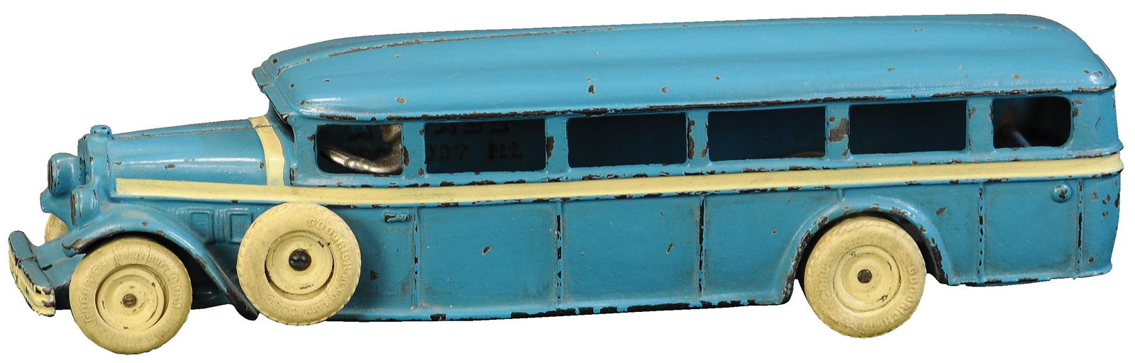 ARCADE WHITE 6 BUS: 604. ARCADE WHITE 6 BUS | Book example, page 51, "Cast Iron Automotive Toys, 2000." | 13" l. | Old paint restoration. | $500 - $750