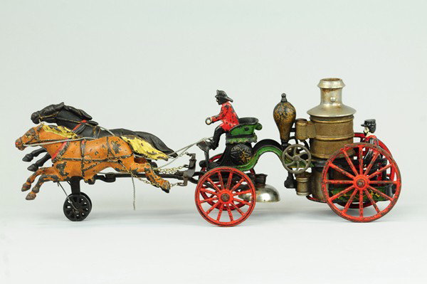 PRATT & LETCHWORTH FIRE PUMPER: Cast iron, open solo seat frame, painted in green and black, seated driver, red spoke wheels, nickel boiler, bell attached to hitch, drawn by two horses painted in black and one in brown. 17 1/2" l.