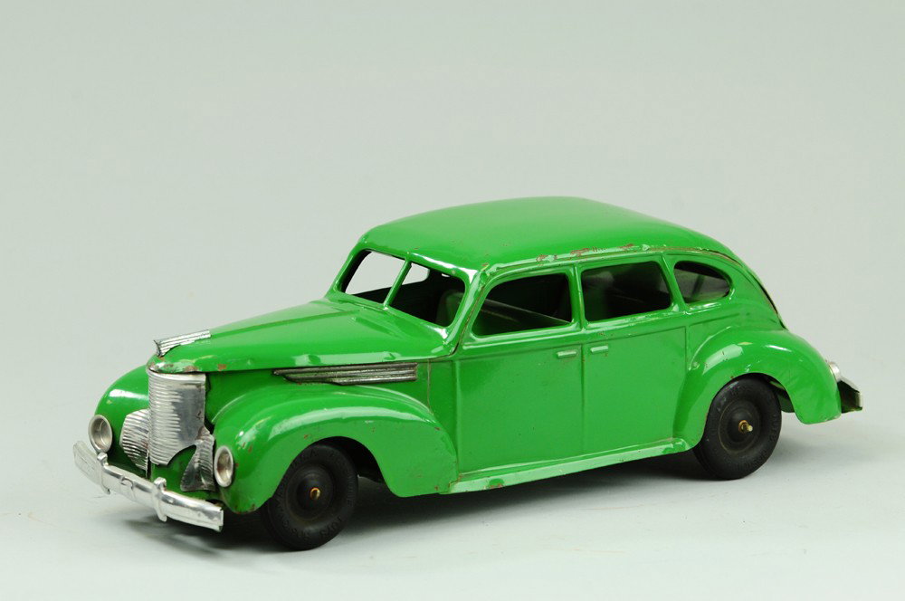 1939 KINGSBURY DESOTO: Kingsbury, pressed steel, painted in green body, nickel trim, clockwork mechanism. 14" l.