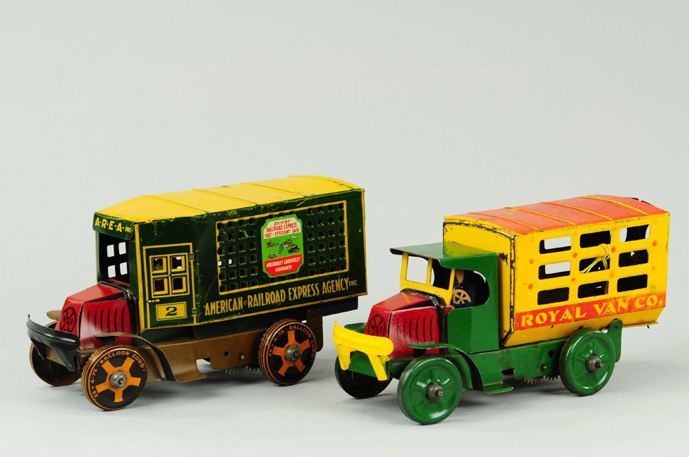 MARX ROYAL VAN AND RAILROAD EXPRESS TRUCK: Lithographed tin, both with enclosed van bodies, one stake side and the other mesh side, extensive graphics, each with key wind. 9 1/2" l.