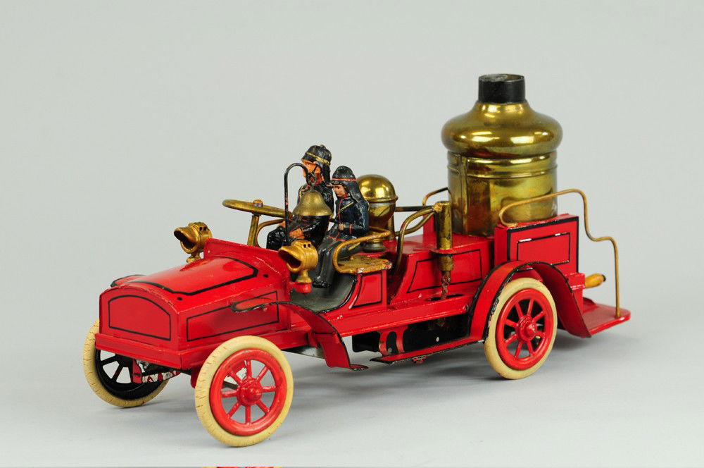 GUNTHERMANN FIRE PUMPER: Germany, c. 1900, hand painted tin, done in red body, vertical boiler on body with railed rear platform, clockwork driven, bell appears under bonnet, hand bell on dash. Well detailed as this is one in