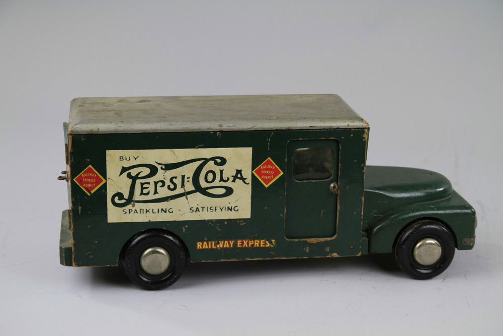 BUDDY 'L' REA TRUCK WITH PEPSI COLA AD: Wooden delivery van truck, painted in green with silver roof, side of body features large Pepsi Cola ad, good overall decals. 16" l.