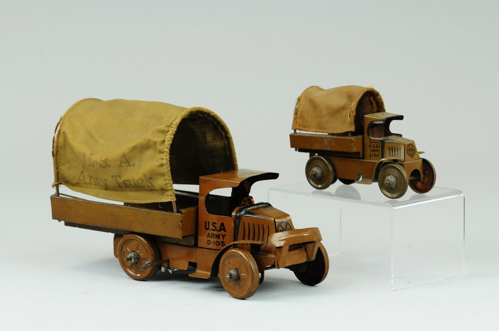 MARX ARMY TRUCKS: Lithographed tin, 'C' cab Macks with canopy covered bodies, each reads, "USA Army Truck" on sides. 5 1/4"-11" l.