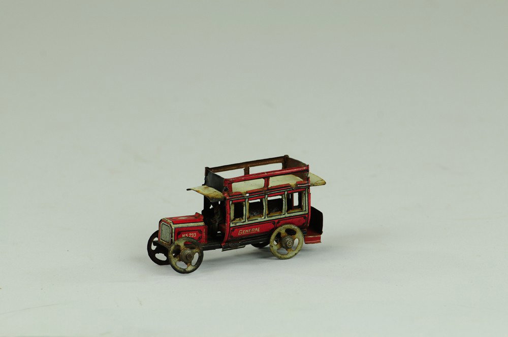 GENERAL PENNY TOY BUS: Fischer, Germany, finely detailed example, red and grey paint scheme, marked "General" on sides. 3 3/4" l.