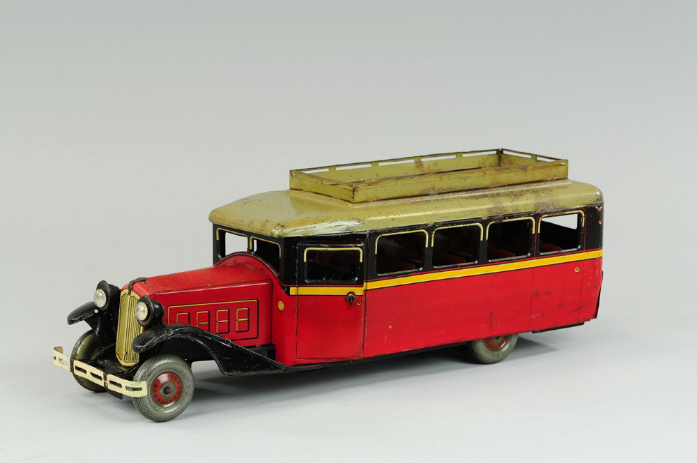 CHARLES ROSSIGNAL RENAULT: Bus, c. 1935, lithographed tin impressive size done in red with grey roof, disc wheels, great color scheme overall, scarce example. 16" l.