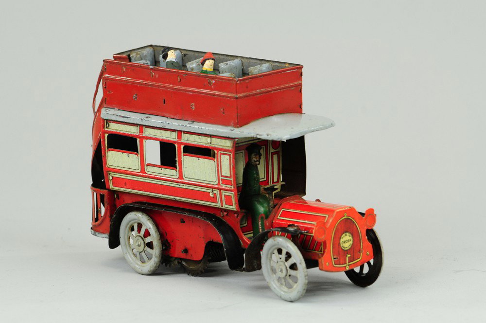 OROBR DOUBLE DECKER BUS: Lithographed tin, done in red body, white windows, upper deck bench seating, wind up action, sliding rear door. 8" l.