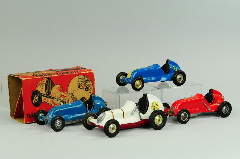 LOT OF FOUR THIMBLE DROME RACERS: Varied models and drive functions, most in (VG Cond.), two are gas powered. Includes one tattered box. 8 1/2"-9" l.