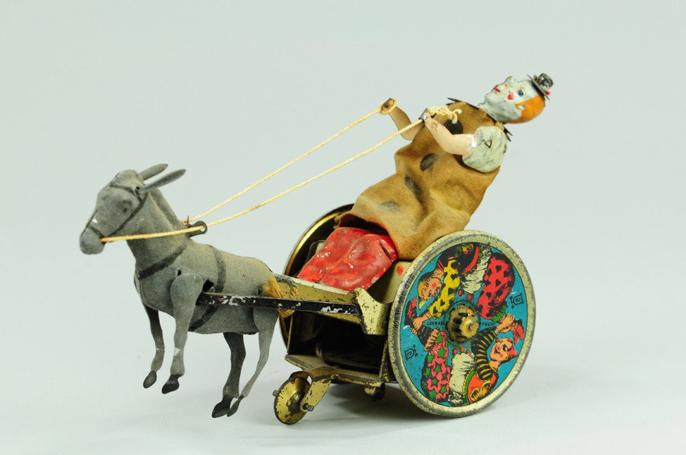 LEHMANN BALKY MULE: Germany, a familiar Lehmann creation, features clown drawn by uncooperative mule, clockwork action. 7 1/4" L.