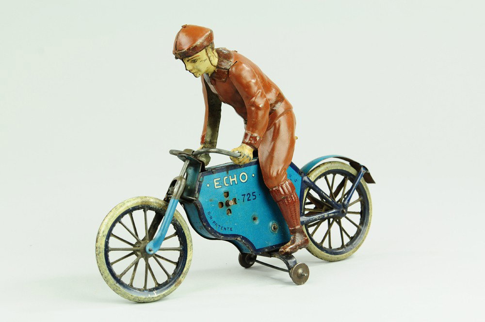 LEHMANN ECHO CYCLIST: Germany, lithographed tin, well detailed toy cyclist on early spoke wheel model, clockwork driven, reads "Echo" on both sides. 8 1/2 "l.