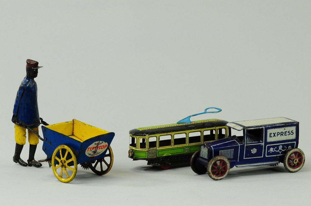 LOT OF THREE TIN TOYS: Assorted grouping includes C&K Express Van, Fischer Trolley and Strauss Tip-Top toy with key wind. 5 1/4" to 6 1/2" l.