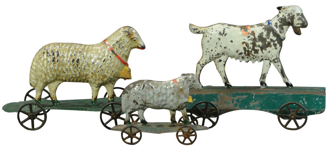 THREE EARLY AMERICAN TIN ANIMAL TOYS (1 of 3)