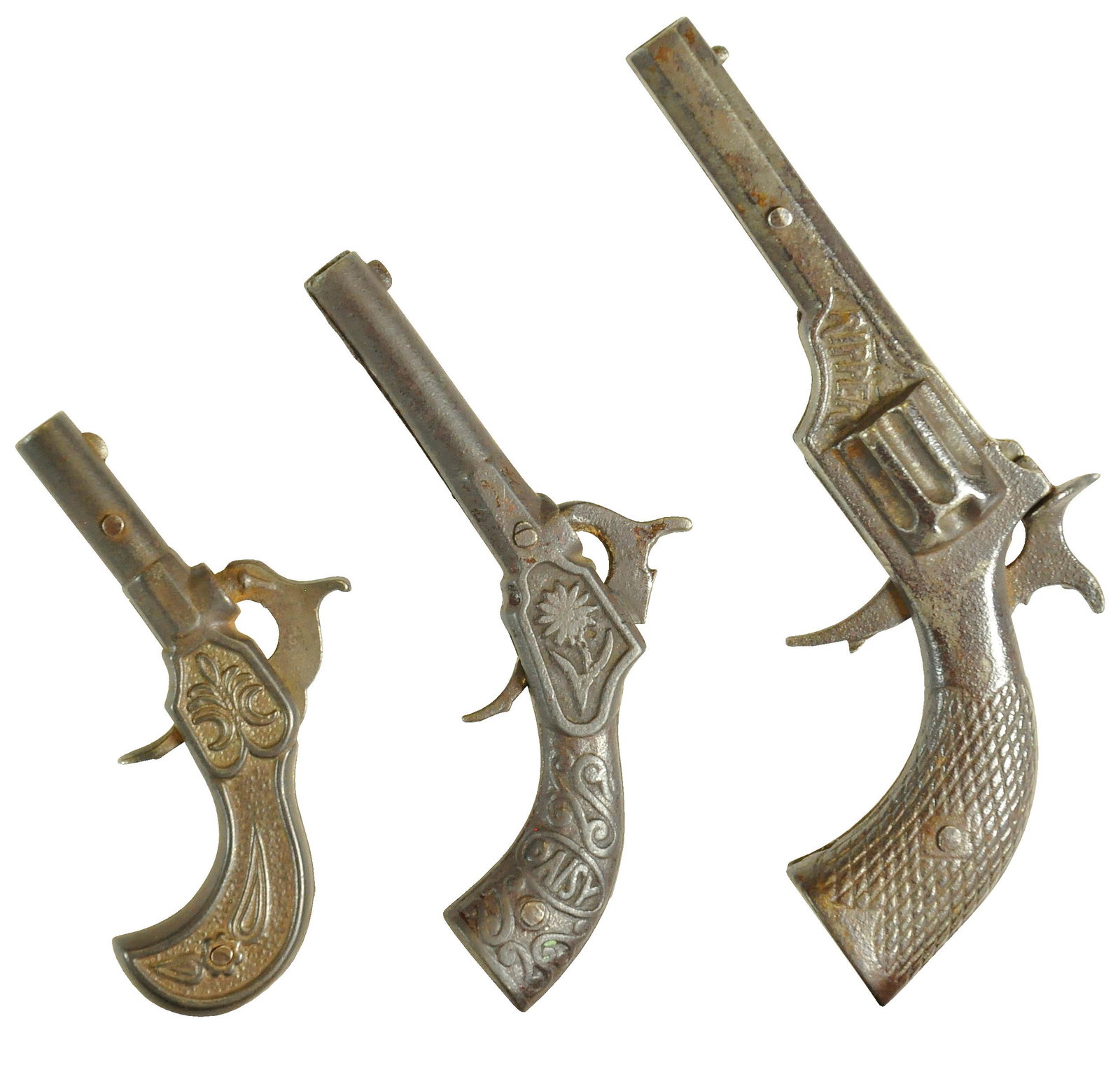 THREE EARLY CAST IRON CAP PISTOLS: 168. THREE EARLY CAST IRON CAP PISTOLS | Lot includes a Daisy and two other pistols. The Schroeder Collection - Abbys Attic Finds 6.5" l. Crack to Daisy handle, crack to barrel of the smallest gun (sp