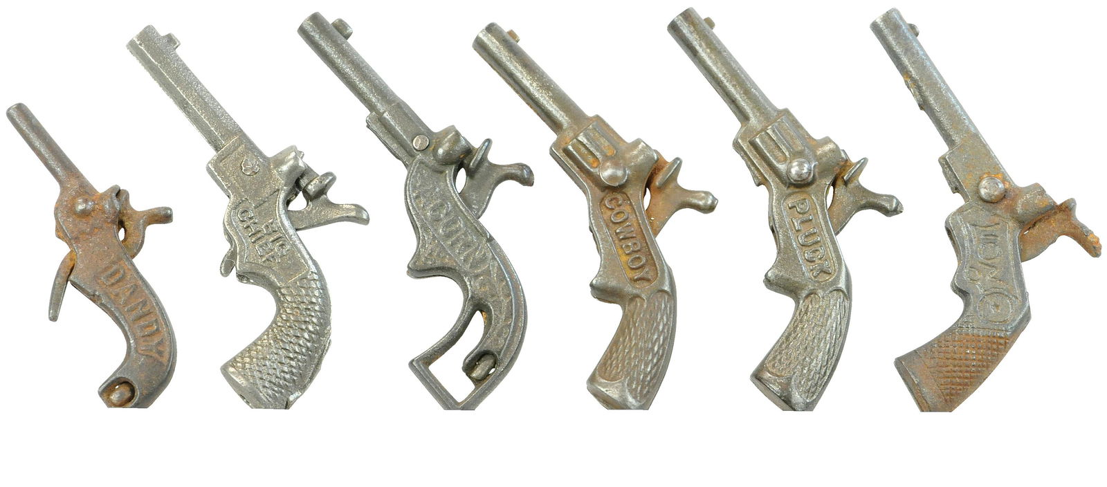 SIX DETAILED CAST IRON CAP GUNS: 179. SIX DETAILED CAST IRON CAP GUNS | Lot includes; Dandy, Cowboy, Acorn, Cowboy, Pluck & Lion cap guns. The Schroeder Collection - Abbys Attic Finds 4" l. (Very Good Condition) $300 - $500