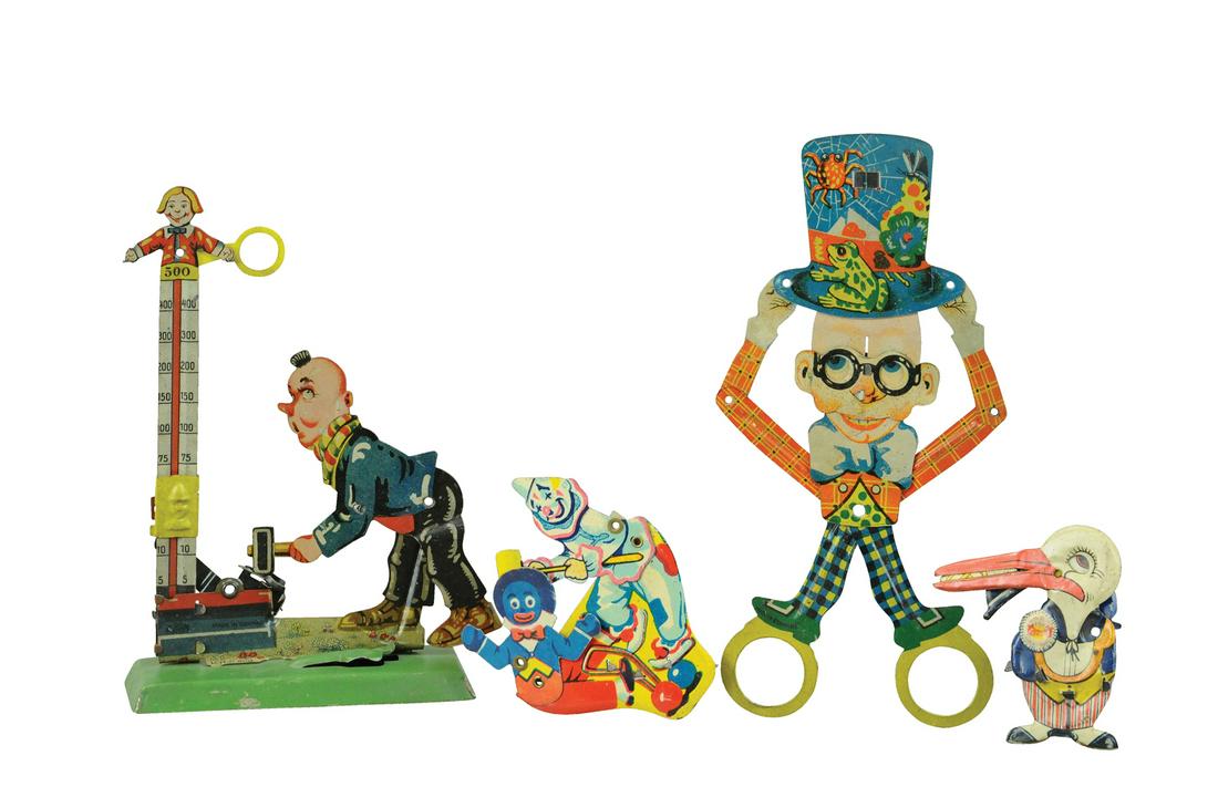 FOUR GERMAN CLICKER TOYS (1 of 2)