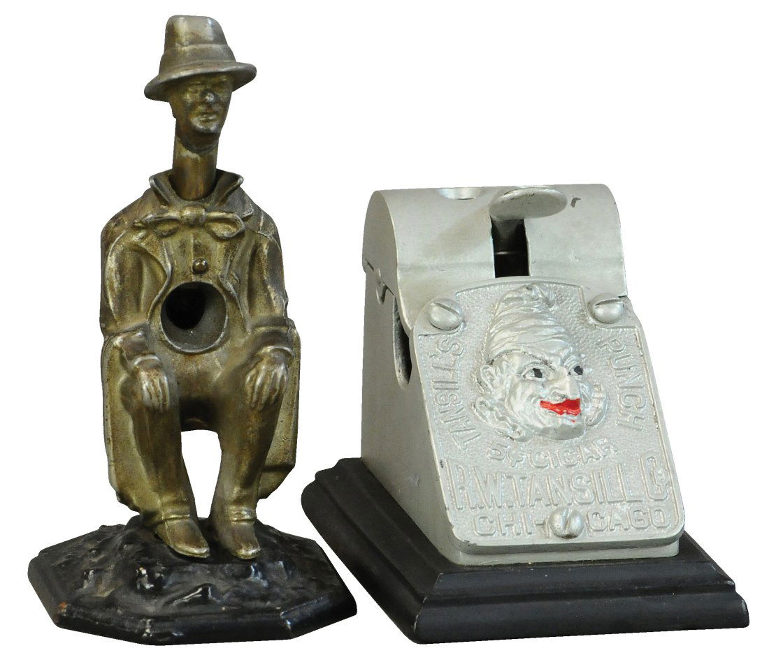 TWO ANIMATED CIGAR CUTTERS