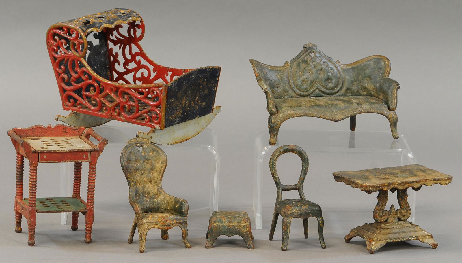 SEVEN PIECES OF CAST IRON FURNITURE (1 of 2)