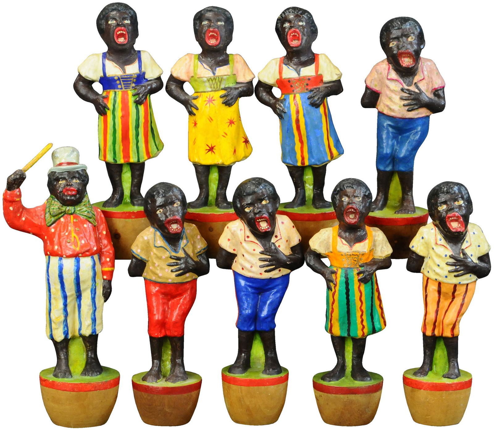 BLACK CHOIR W/ CONDUCTOR SKITTLES: 1266. BLACK CHOIR W/ CONDUCTOR SKITTLES | Complete set of nine pins consisting of conductor and singers. Provenance: Ed and Brenda DeGarbolewski Collection. | 8.5" h. | Conductor's hat brim is repaire