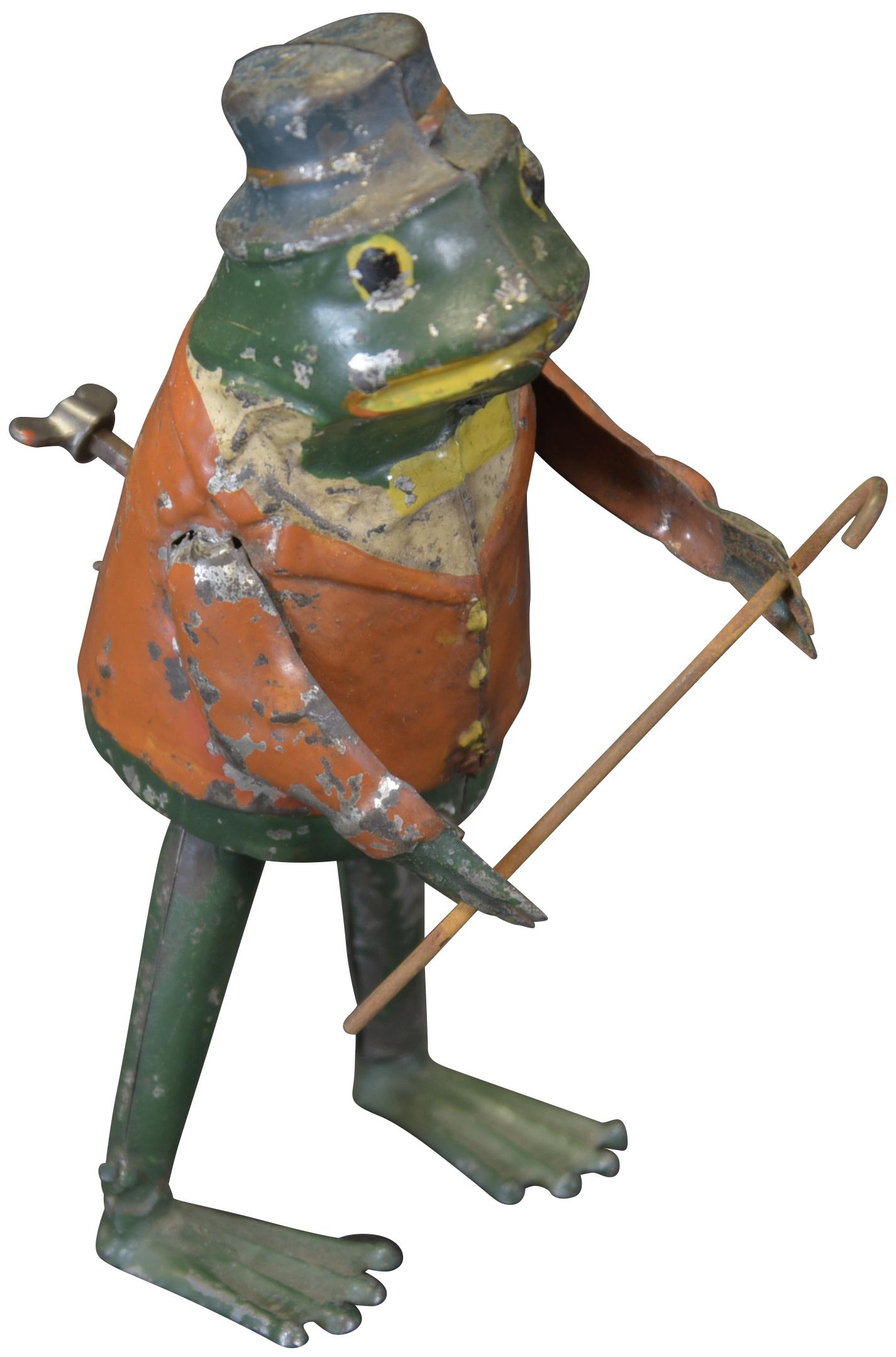 GUNTHERMANN FROG WALKING W/ CANE: 1505. GUNTHERMANN FROG WALKING W/ CANE | Wind-up, Germany. | 6" h. | Left arm is partially repainted, otherwise (Very Good to Excellent Condition) for age. | $250 - $450