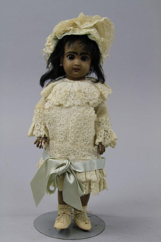PRETTY FRENCH BROWN BISQUE DOLL: Later Jumeau open mouth doll with six small upper teeth with fired in color, incised only '6' and some artist's initials, she is on the original body with original finish, wears antique black mohair w