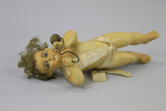 WAX CHRISTMAS ANGEL: All poured wax angel cherub with trumpet, inset glass eyes and mohair wig with loop in back torso and wire attached allowing for suspension, there are also two multi colored wax wings but are currentl