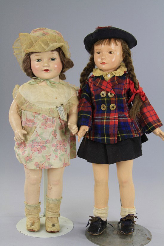 LOT OF TWO AMERICAN COMPOSITION DOLLS: In plaid jacket is an all original Dewees Cochran doll by Effanbee with gold heart bracelet, also includes "Dolly Rosebud" doll with original clothes and cloth tag. Each 19 1/2" (49 cm).