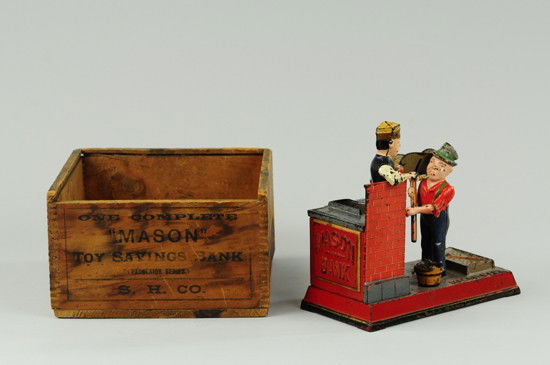 MASON MECHANICAL BANK WITH BOX: Shepard Hardware Co., designed by Charles G.Shepard & Peter Adams, patented 2/8/1887. The comical appearing Hod Carrier receives the coin and throws it forward, depositing it in the bank. The mason ra