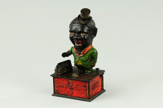 STUMP SPEAKER MECHANICAL BANK: Shepard Hardware Co., designed by Charles Shepard & Peter Adams, patented 11/16/1886. A very comical appearance is given to the face the lower jaw being balanced on pivots and easily kept in motion. T