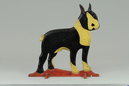 BOSTON TERRIER DOORSTOP: Oversized, cartoon-like depiction of large Boston Terrier done in white and black with red wedge base. Very unusual. Book Example. 13 3/4" w. x 14" h.