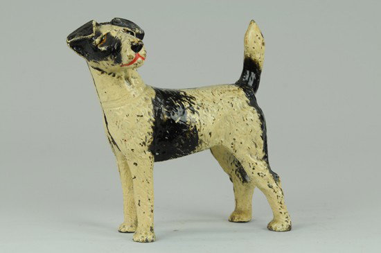 FOX TERRIER DOORSTOP: Very unusual full figured terrier with long snout. Rare variation. Painted eyes and mouth. 7" w. x 9 1/4"h.