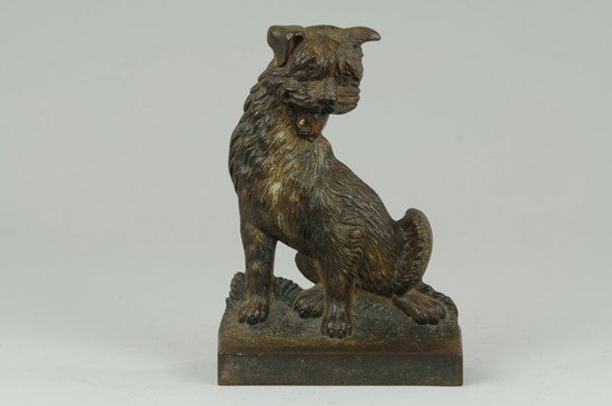 B&H CAIRN TERRIER: Bradley & Hubbard dog doorstop with whimsical expression. Great detailed casting marked "B&H." 6 1/4" w. x 8 7/8" h.