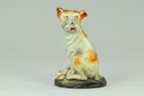"MUTT AND HIS BONE" DOORSTOP: Charming depiction of a seated dog with mouth open, bone by his paws. Inscribed, "Mutt and his bone" on base. Fun piece. 5 5/8" w. x 8 3/8" h.