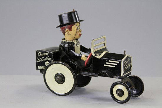CHARLIE McCARTHY BENZINE MOBILE: Louis Marx, lithographed tin, done in black with white trim, features Charlie at wheel, clockwork activated. 7" l.
