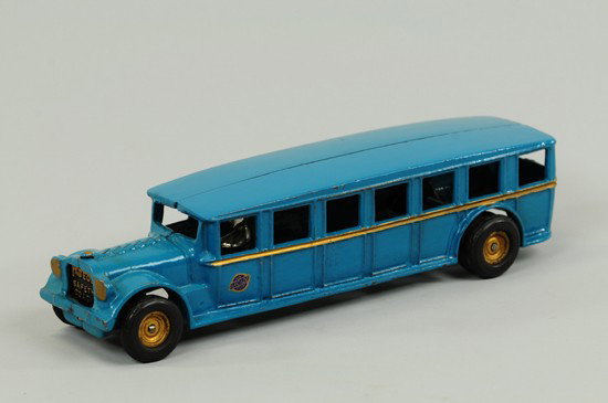 FAGEOL BUS: Arcade, cast iron, done in blue overall, classic styling with flat roof and open windows, gold painted hubs with black rubber tires, nickel plated driver. 12 1/4" l.