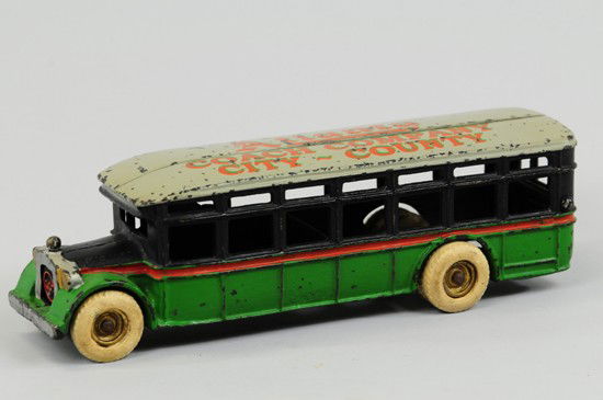 ACF COACH PRIVATE LABEL BUS: Arcade 'Atlanta Coach Company, City - County,' cast iron, ornate painted lettering on grey roof in varied colors, green and black bus has gold painted hubs with white rubber tires. 12 1/4" l.