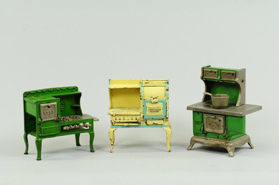 LOT OF THREE EARLY STOVES: Cast iron lot includes Kenton "Favorite" painted in green with nickel plated accents, Kenton "Kent" painted in green with side oven and Arcade example in cream with light blue banding marked "Hotpoint