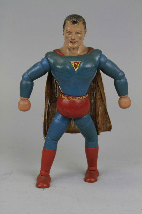 SUPERMAN FIGURE: Marked "Copyright by Superman Inc., Made by Ideal Novelty & Toy Co.," on rear of belt, arms, legs and head are wood and movable, head is composition, features the original Superman chest logo and plai