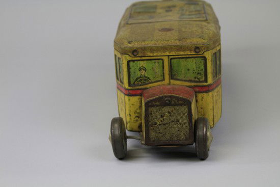 LARGE PERUGINA STORE DISPLAY BUS BISCUIT TIN: Italy, c. 1925. Very rare example, impressive 20" overall length, lithography is exceptional, while the condition needs to be addressed with restoration, it is a great candidate for a quality piece.