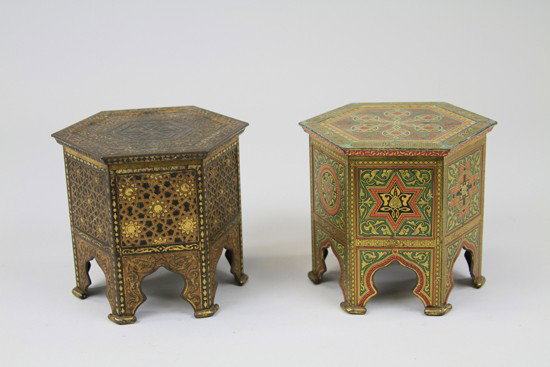 TWO HUNTLEY & PALMERS TABLE BISCUIT TINS: England, c. 1904. Both octagonal shaped and lithographed tinplate, comprising "Cairo" elaborately detailed geometric designs, raised on shaped feet. Together with "Syrian", finished and embossed in br