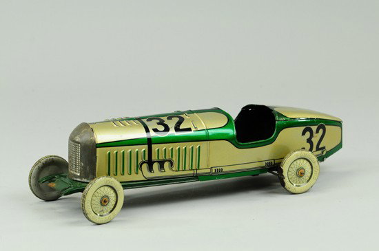 LARGE RACE CAR: Lithographed tin, done in bright green body, silver trim, extensive graphics overall, key wind activated, disc wheels. 15 1/4" l.