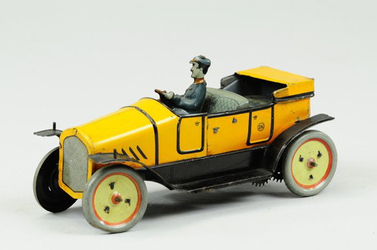 OPEN FOUR SEAT TOURER: Muller & Kadeder, Germany, c. 1912, not many autos were produced by M&K, lithographed tin done in yellow body, fully lithographed seating with driver, disc wheels done in white, clockwork driven, top 