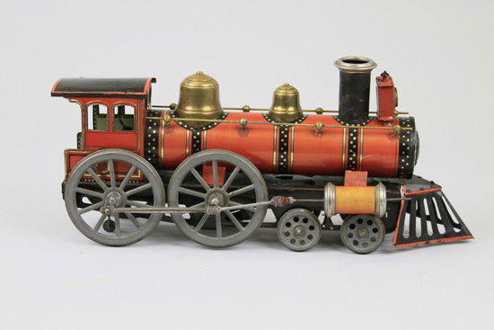 GUNTHERMANN LOCOMOTIVE: Germany, lithographed tin, red body, full compliment of boiler pieces done, bell stack, railed sides, cow catcher, clockwork driven, articulated rod. 16" Overall length.