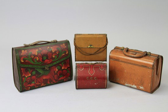 FOUR HANDBAG FORM TINS: Lithographed Tinplate, comprising Huntley & Palmers "Handbag", c. 1910 in tan pigskin, a red Carr's "Kitbag" c. 1905, marked "C.C.C.", a green Edmonson Red Seal Toffee tin, with red and yellow Winged 