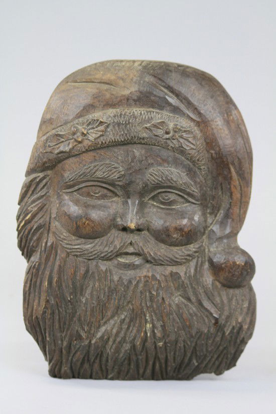 SANTA MOLD PATTERN: Mahogany, used to make mold for pulp Santa face from a long ago closed maker of pulp and composition Halloween and Christmas items located in Canton, Ohio. 15" h.