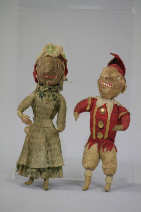 RARE PRESSED COTTON PUNCH AND JUDY ORNAMENTS: Two very rarely seen Punch and Judy Christmas tree ornaments in pressed cotton with paper hands, crepe paper outfits and interesting puppet like faces with exaggerated noses and chins. Each 4 3/4" h.