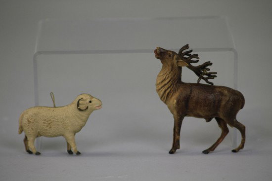 DRESDEN REINDEER AND RAM ORNAMENTS: Germany, reindeer with red tongue and full set of antlers and gold horn ram, both full body with nice detail. 2 1/2" to 3".