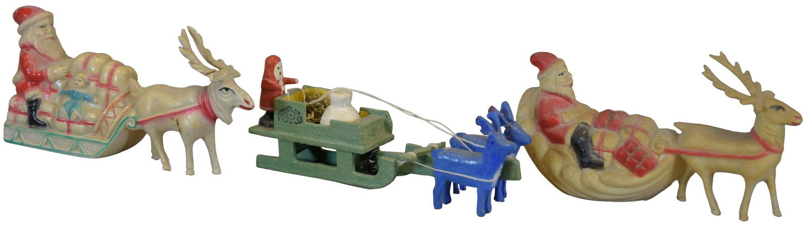 THREE SANTA S IN SLEIGHS (1 of 3)