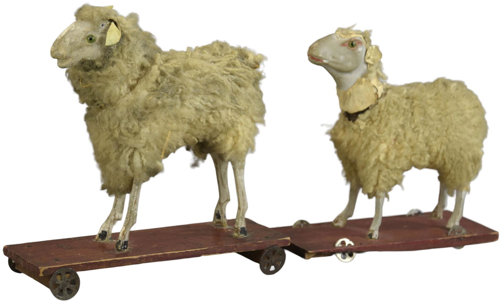 TWO SHEEPS ON PLATFORM: 185. TWO SHEEPS ON PLATFORM | Glass eyes. | 7"-8" l. | Fur missing on the smaller sheep, (Very Good Condition) | $300 - $600